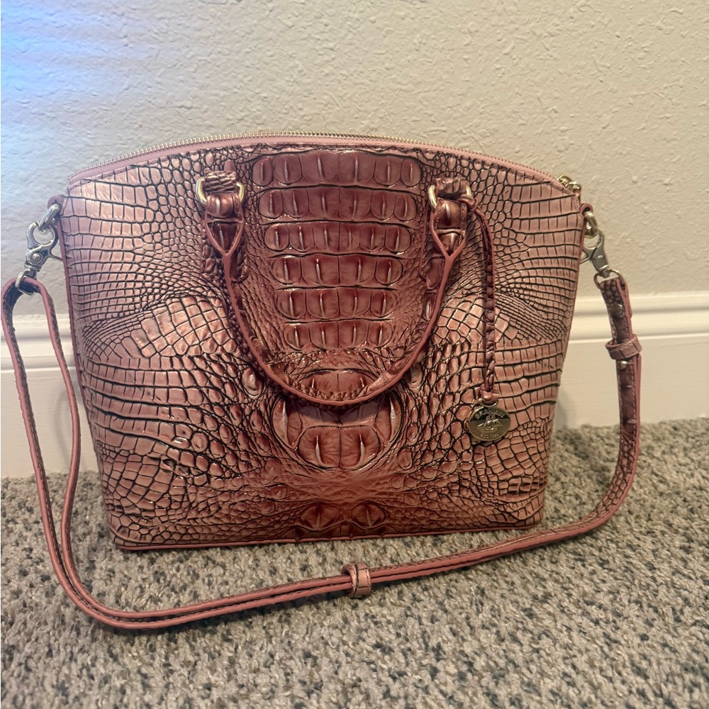 Pink Brahmin with wallet